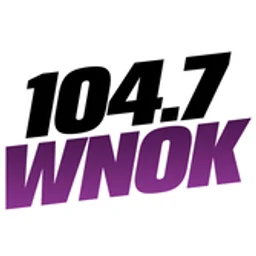 104.7 WNOK — The United States Of America logo